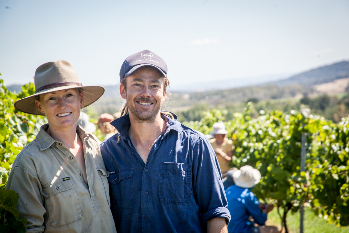 A man and woman in the vineyard 